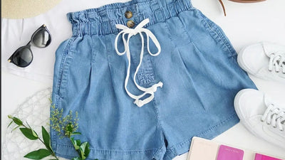 CHAMBRAY DRAWSTRING RUFFLE WAIST SHORTS